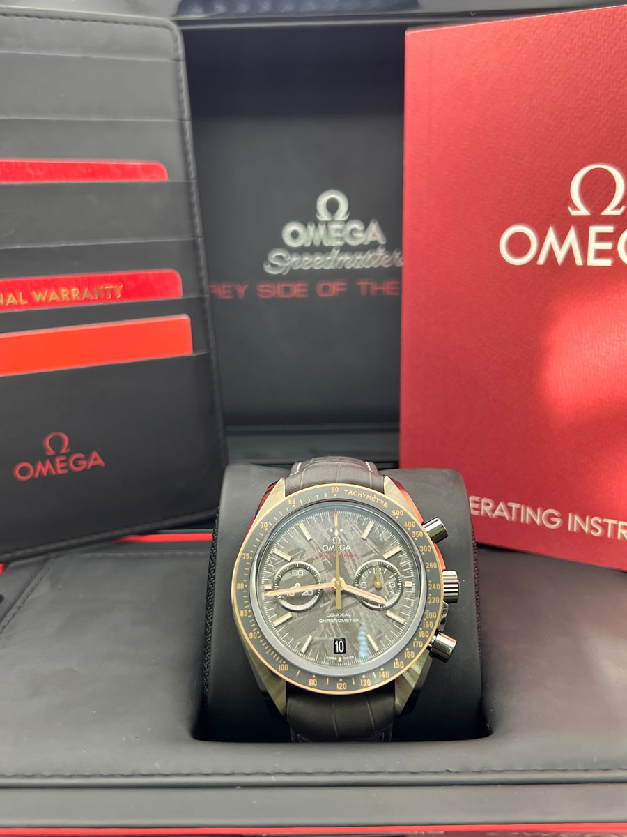 New/Unworn Omega Speedmaster Dark Side of the Moon Meteorite 311.63.44.51.99.001 Complete Set